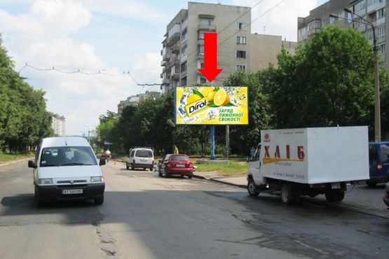 Фото рекламной плоскости по адресу Троллейбусная ул., 12, возле аптеки, из центра
