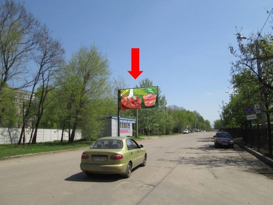 Фото рекламной плоскости по адресу Лосевская ул., возле ст. м. "Индустриальная", автостанции №6, из центра