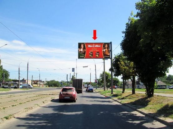 Фото рекламной плоскости по адресу Морозова ул. / пр. Героев Сталинграда, на светофоре