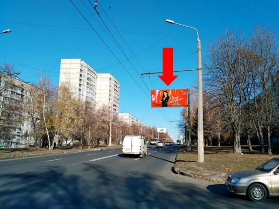 Фото рекламної площини за адресою Гвардейцев Широнинцев, 52,  в сторону ул. Бучмы