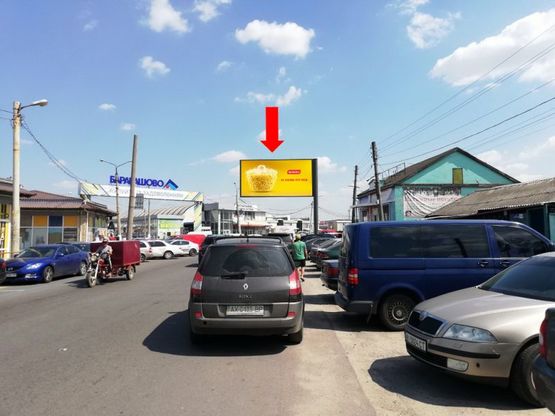 Фото рекламної площини за адресою Тюринская ул., 148, рынок "Барабашово", к пр. Павлова