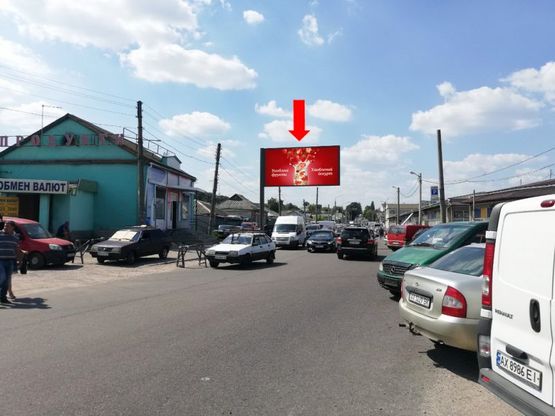 Фото рекламної площини за адресою Тюринская ул., 148, рынок "Барабашово", в центр