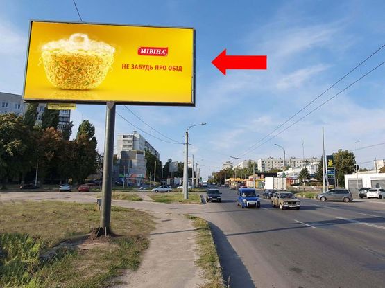 Фото рекламной плоскости по адресу Гвардейцев Широнинцев ул. - ул. Бучмы, напротив АЗС "Окко", в центр