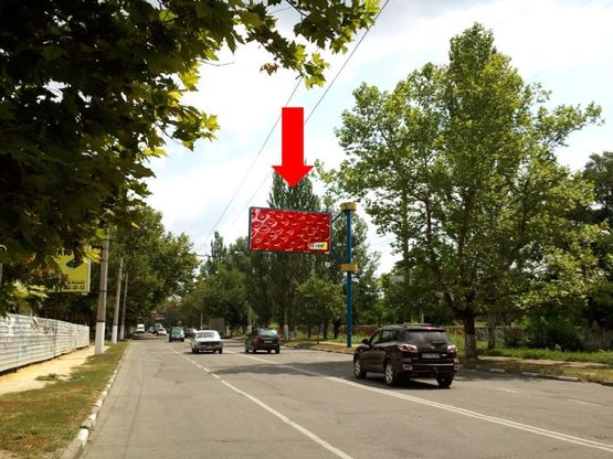 Фото рекламной плоскости по адресу Кулика ул. / Ушакова пр., гусь, над дорогой