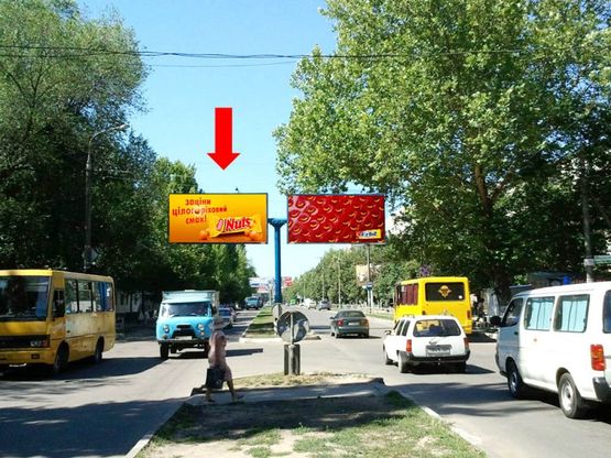 Фото рекламной плоскости по адресу Университетская ул. (бывш. 40-летия Октября ул.) / Мира ул., возле "Днепровского" рынка, разделитель, в центр, левый