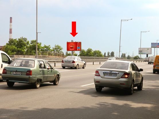 Фото рекламной плоскости по адресу Надднепрянское шоссе, 800 м до ст. м. "Выдубичи", в сторону мост Южный