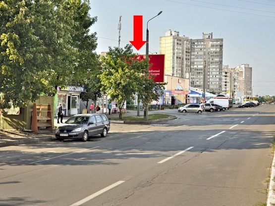 Фото рекламной плоскости по адресу Ревуцкого ул., 18, в сторону Ахматовой ул.