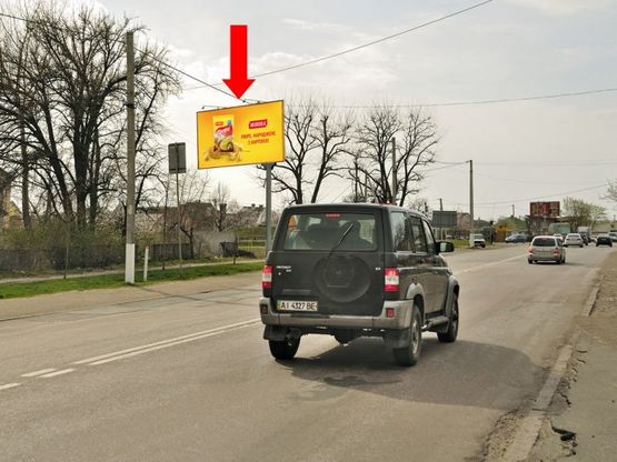 Фото рекламной плоскости по адресу Киевский Путь ул., 158, остановка "Суворова", возле АЗС Amic, в сторону Киева