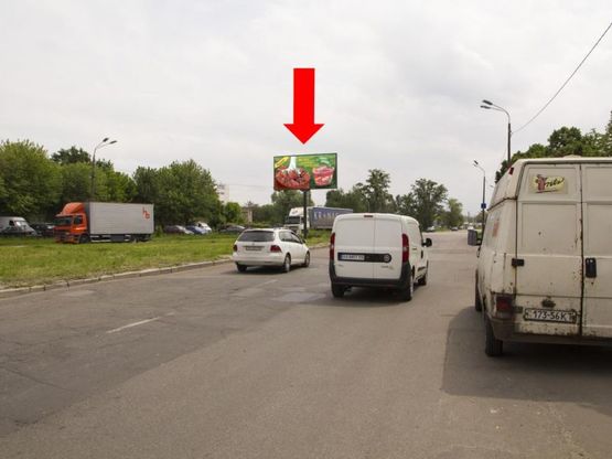 Фото рекламної площини за адресою Королева пр., 4 - ул. Желудева, разделителе, в сторону супермаркета "Сильпо"