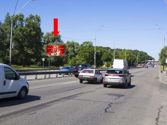 Фото рекламной плоскости по адресу Победы пр. - ул. Ушакова, напротив, из центра