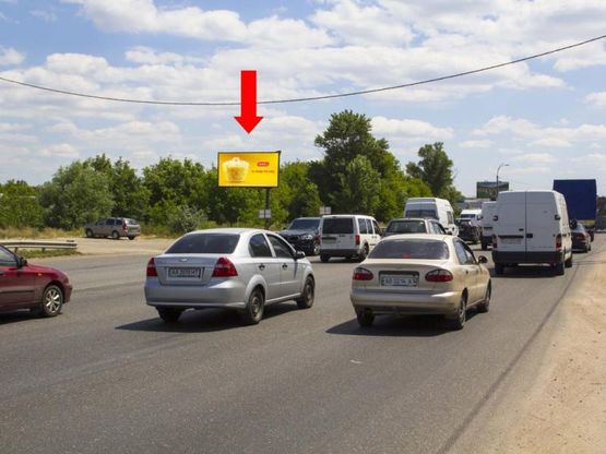 Фото рекламної площини за адресою Кольцевая дорога - пер.Шевченка, за Жулянским мостом, в сторону Одесской пл.