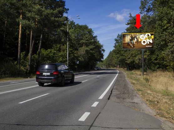 Фото рекламной плоскости по адресу Столичное шоссе ул., напротив Олимпийского мишки, в сторону Киева