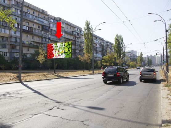 Фото рекламної площини за адресою Тимошенко ул., 6, напротив супермаркета "Экомаркет", в сторону ул. Малиновского