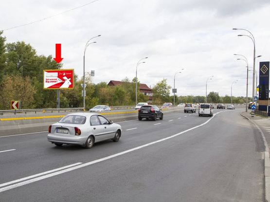 Фото рекламной плоскости по адресу Набережно-Рыбальская ул., напротив АЗС “Glusco”, возле клуба “Disco Radio Hall”, в сторону Набережно-Крещатицкая ул.