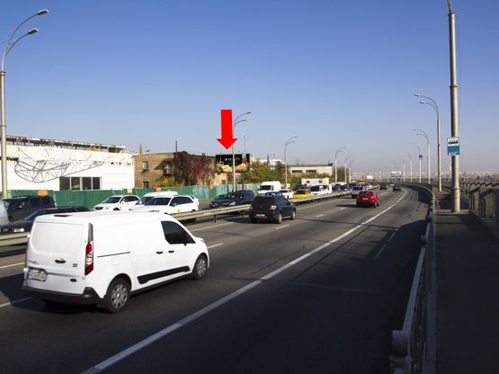 Фото рекламної площини за адресою Набережно-Рыбальская ул., перед Подольско-Воскресенским мостом, в сторону  пр. Бандеры, Оболони