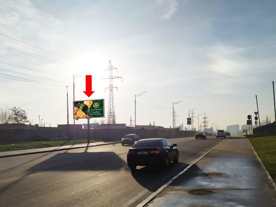 Фото рекламной плоскости по адресу Кульженков семьи ул. (бывш. Дегтяренка ул.) - ул. Полярная, в сторону ТРЦ "Караван", ул. Луговая