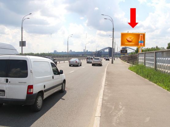 Фото рекламної площини за адресою Набережно-Рыбальская ул., 100м до поворота на Электриков ул., в сторону Набережно-Крещатикская ул.