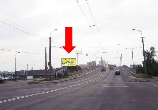 Фото рекламной плоскости по адресу Ровенская ул., возле автомагазина "АТЛ", мост, в центр