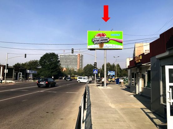 Фото рекламной плоскости по адресу Шевченко ул., 358, возле ТЦ "ВАМ", супермаркета "Сильпо", на светофоре, из центра