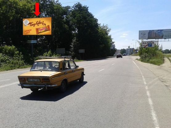 Фото рекламной плоскости по адресу Трасса Киев-Львов, с. Малехов, АЗС "WOG" въезд в город