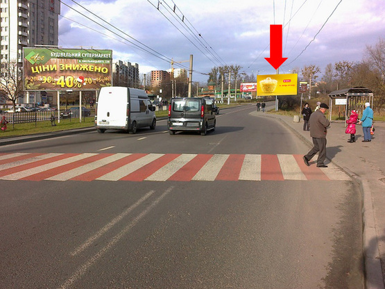 Фото рекламной плоскости по адресу Черновола пр., 101, возле пиццерии "Челентано", из центра