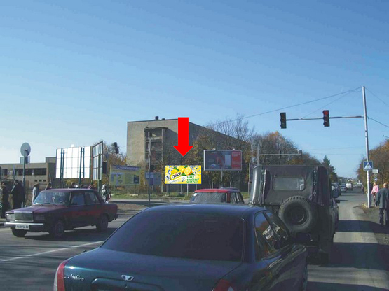 Фото рекламной плоскости по адресу Масарика ул. (бывш. Матросова ул.) / ул. Кооперативная, возле рынка, в центр