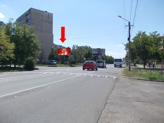 Фото рекламной плоскости по адресу Росвиговская ул. / ул. Университетская, микрорайон "Росвигово", возле рынка