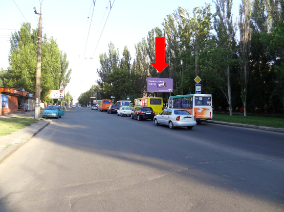 Фото рекламной плоскости по адресу Мира пр. / Театральная ул. (бывш. Васляева ул.), возле Приватбанка, супермаркета "Novus", из центра