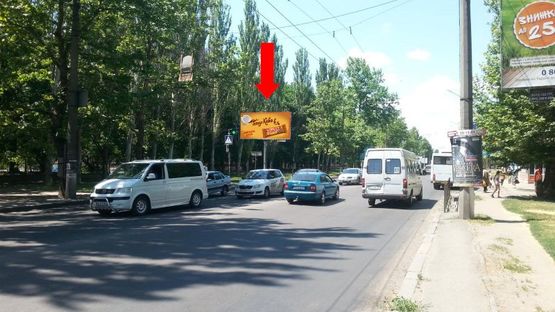 Фото рекламной плоскости по адресу Мира пр. / Театральная ул. (бывш. Васляева ул.), возле Приватбанка, супермаркета "Novus", в центр