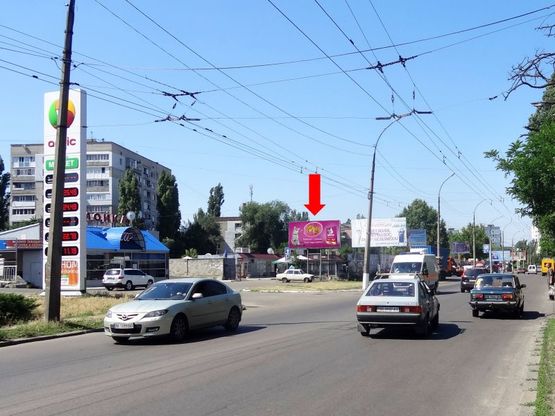 Фото рекламной плоскости по адресу Карпенко ул. / Мореходная ул., возле АЗС "Amic", супермаркета "АТБ", из центра