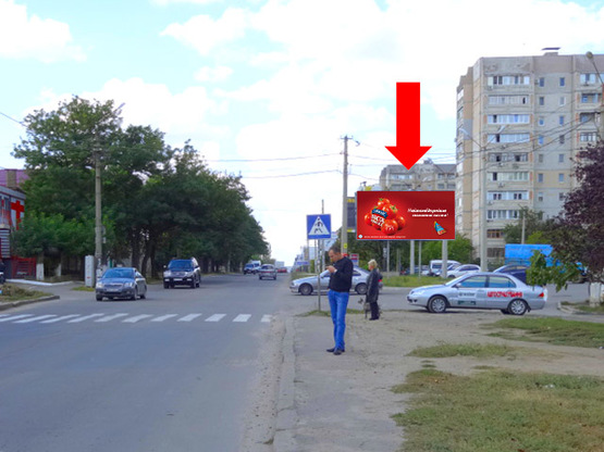 Фото рекламной плоскости по адресу Херсонское шоссе, 36, возле супермаркета "Экомаркет", в центр