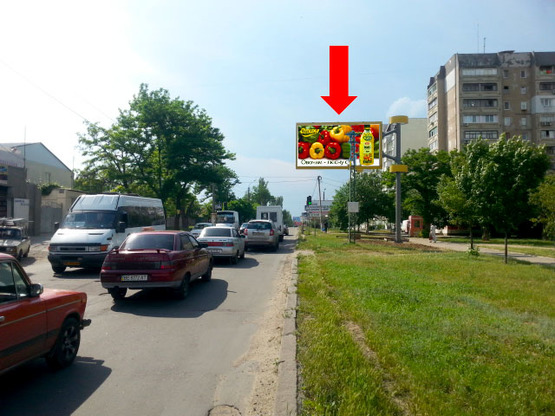 Фото рекламной плоскости по адресу Херсонское шоссе, 30, возле супермаркета "Экомаркет", в центр