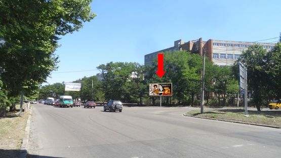 Фото рекламної площини за адресою Покровская ул. (бывш. Кирова ул.) / Космонавтов ул., из центра