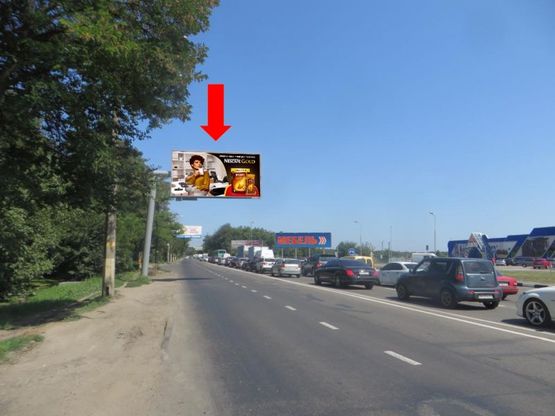Фото рекламної площини за адресою Овидиопольская дорога,  возле супермаркетов "Шестой элемент", "METRO" (флажок)