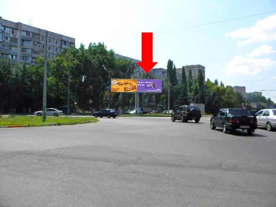 Фото рекламної площини за адресою Небесной Сотни пр. (бывш. Жукова пр.) 75 / Левитана ул., возле супермаркета "Копейка", разделитель, из центра, правая