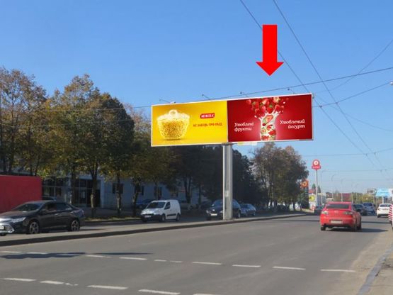 Фото рекламной плоскости по адресу Рихтера ул. (бывш. Щорса ул.) / Радостная ул., 2/4,со стороны пл. Б.Деревянко, разделитель, правая