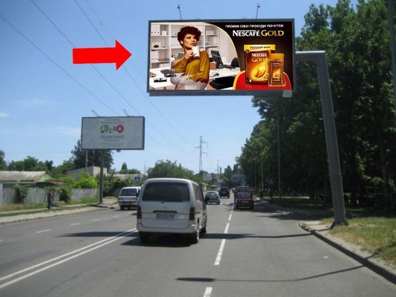 Фото рекламної площини за адресою Малиновского ул., 15, в сторону Адмиральского пр. (флажок)