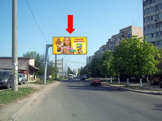 Фото рекламной плоскости по адресу Ильфа и Петрова ул., 49, в сторону  Вильямса ул. (флажок)