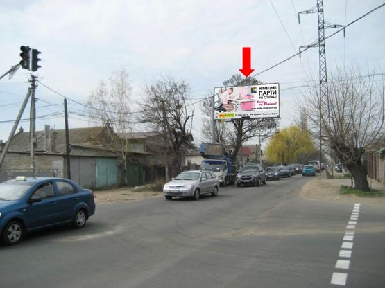 Фото рекламної площини за адресою Малиновского ул., 101 / Спартаковская ул., со стороны Малиновского строительного рынка (флажок)