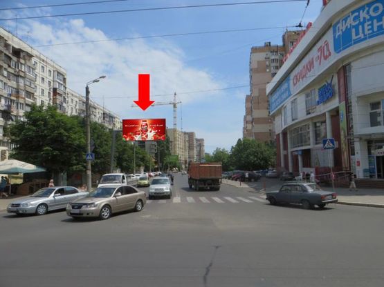 Фото рекламной плоскости по адресу Вильямса ул. / Королева ул., возле супермаркета "Таврия В", в сторону Люфтстдорфской дороги