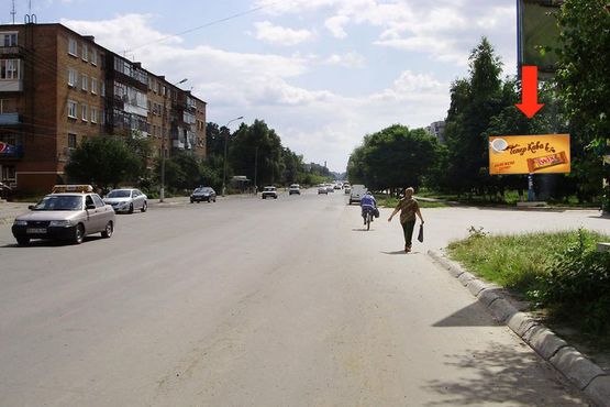Фото рекламної площини за адресою Мира пр. / Первомайская ул., возле гастронома "Подилля", в центр