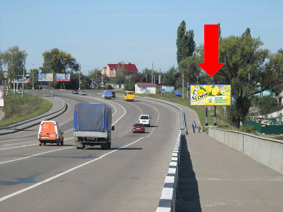 Фото рекламної площини за адресою 2-я Набережная ул. реки Стрелки, возле моста, в сторону Роменской ул.