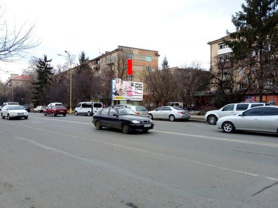 Фото рекламной плоскости по адресу Свободы пр., рядом автовокзал, возле магазина “Вопак”