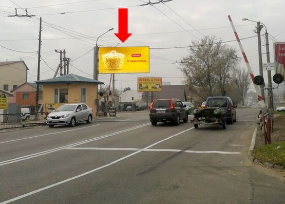 Фото рекламной плоскости по адресу Привокзальная ул. (бывш. Луначарского ул.) / Ласточкина ул. (бывш. Чапаева ул.), в сторону Набережной магистрали