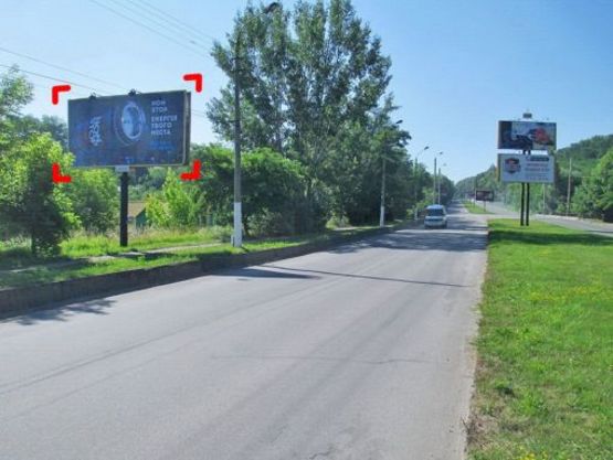 Фото рекламной плоскости по адресу вул. Калинівська (за мостом з вул. Білоруською), місце 1