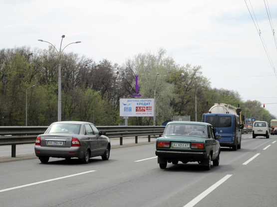 Фото рекламної площини за адресою ул.Глушкова, №30, ТЦ "Магелан", выезд из города