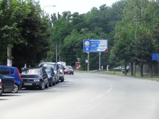 Фото рекламной плоскости по адресу Московской Олимпиады ул, конечная 4 троллейбуса , въезд в город