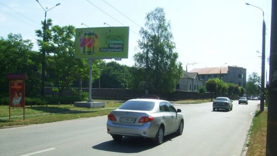 Фото рекламной плоскости по адресу Московской Олимпиады ул, конечная 4 троллейбуса, выезд из города