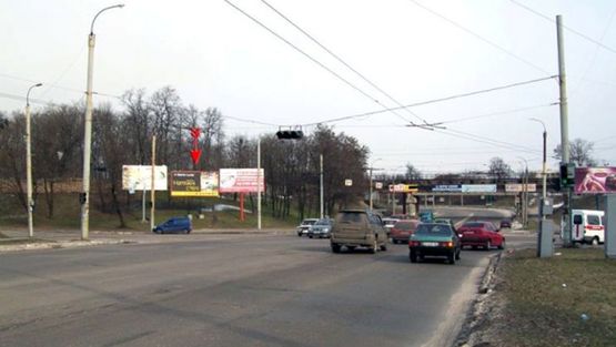 Фото рекламной плоскости по адресу Одесская ул / Сумгаитская ул, со стороны ул. Луначарского, в центр