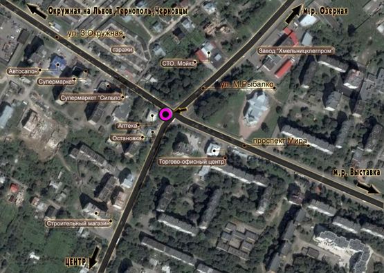 Схема рекламної площини за адресою перехрестя пр.Миру - вул.М.Рибалка. неподалік: зупинка, скупчення МАФів, супермаркет "Сільпо", ТЦ (в центр)